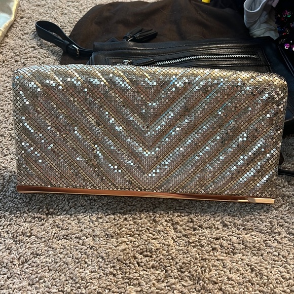 bebe Handbags - BeBe Clutch Purse